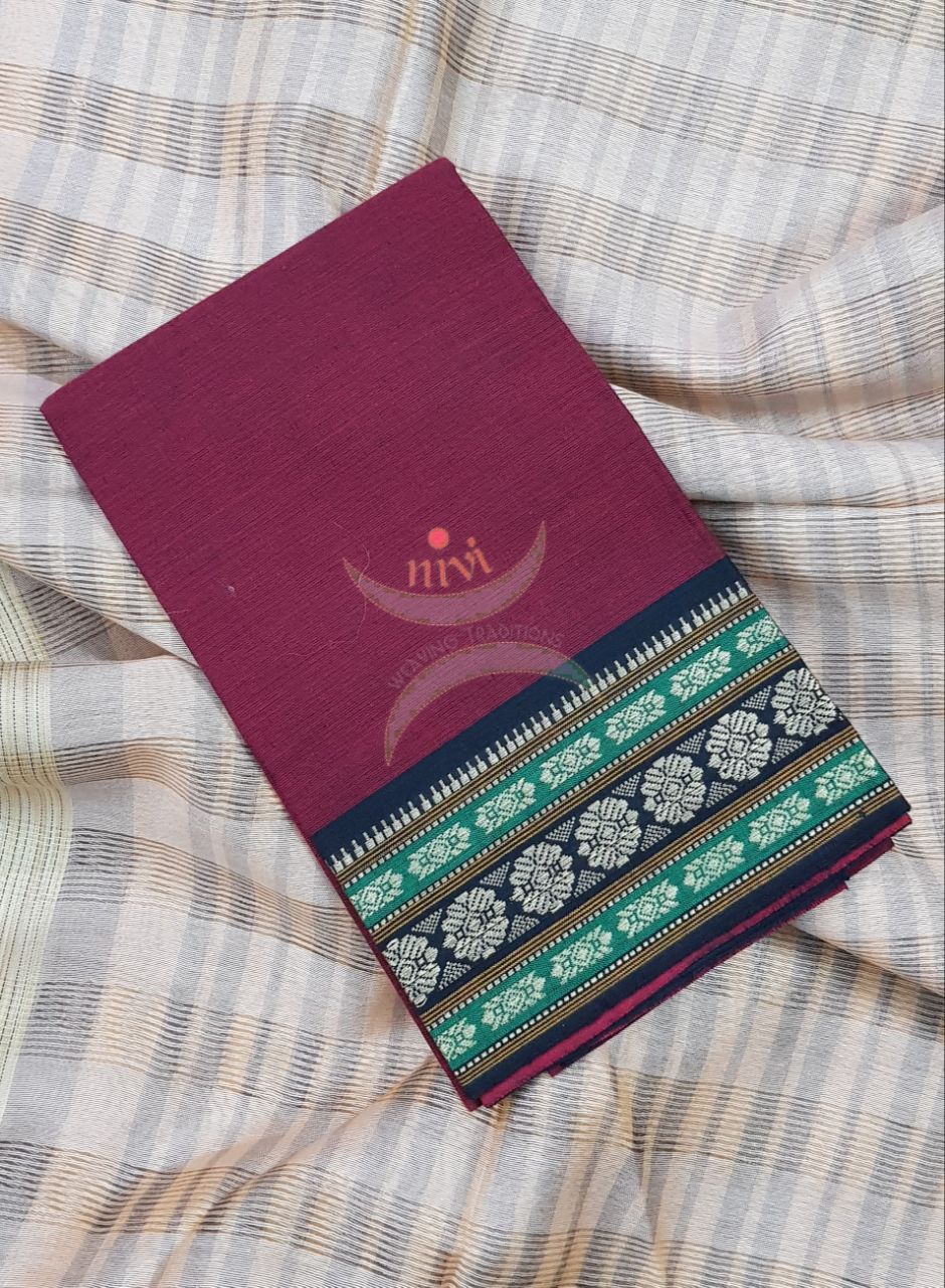 Maroon with black Mangalgiri pure cotton blouse piece with traditional woven border. The blouse comes with 42 inches by  width and length up to 1mt.