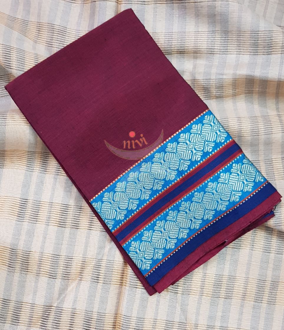 Maroon with blue Mangalgiri pure cotton blouse piece with traditional woven border. The blouse piece comes with 42 inches by width and length up to 1mt.
