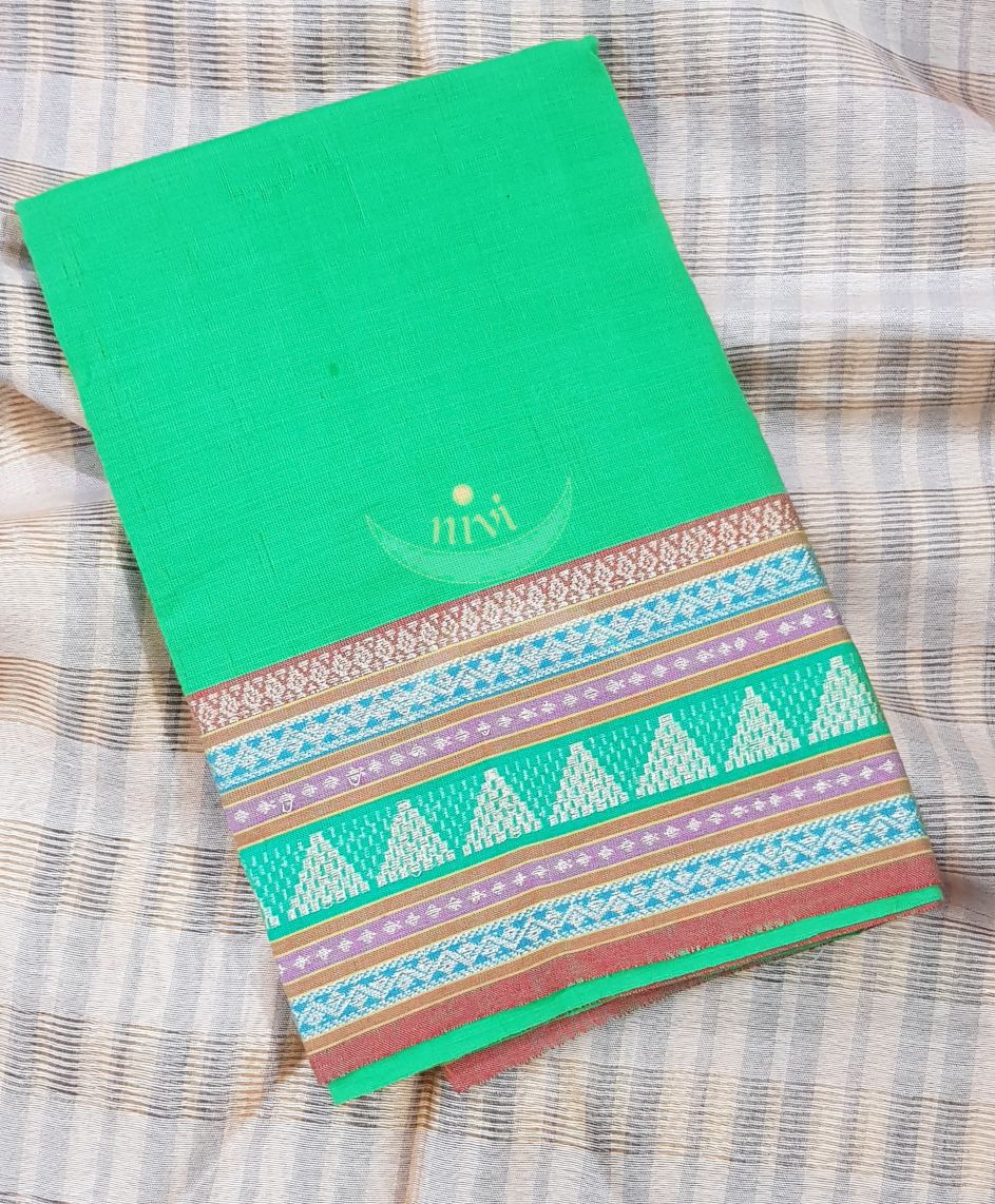 Green with brown mangalgiri pure cotton blouse piece with traditional woven border. The blouse piece comes with 42 inches by width and length up to 1mt.