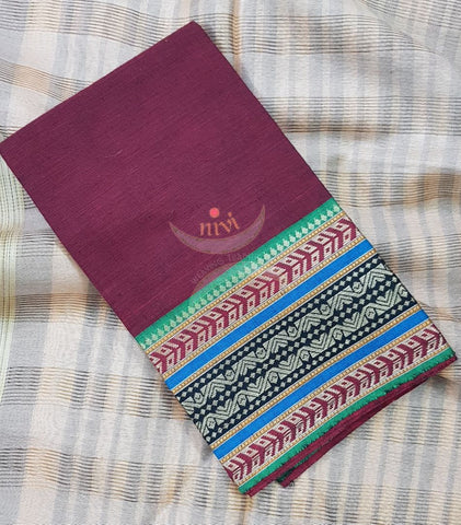 Maroon with green mangalgiri pure cotton blouse piece with traditional woven border. The blouse piece comes with 42 inches by width and length up to 1mt.