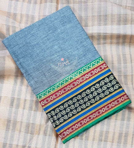 Grey with green Mangalgiri pure cotton blouse piece with traditional woven border. The blouse piece comes with 42 inches by width and length up to 1mt.