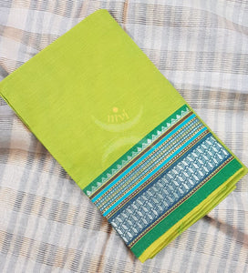 Parrot green with green Mangalgiri pure cotton blouse piece with traditional woven border. The blouse piece comes with 42 inches by width and length up to 1mt.