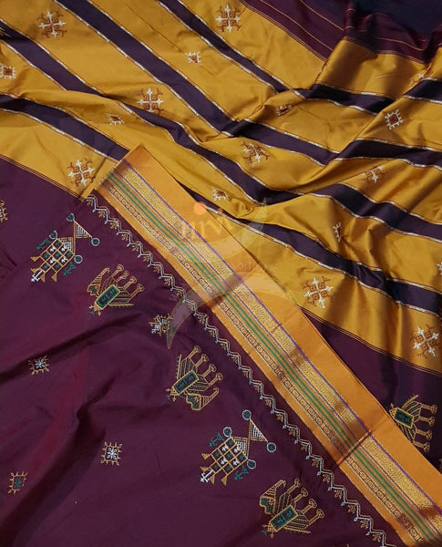 Maroon with mustard border and pallu silk cotton kasuti embroidered Ilkal with Anne ambari  motif and traditional tope teni pallu . 
