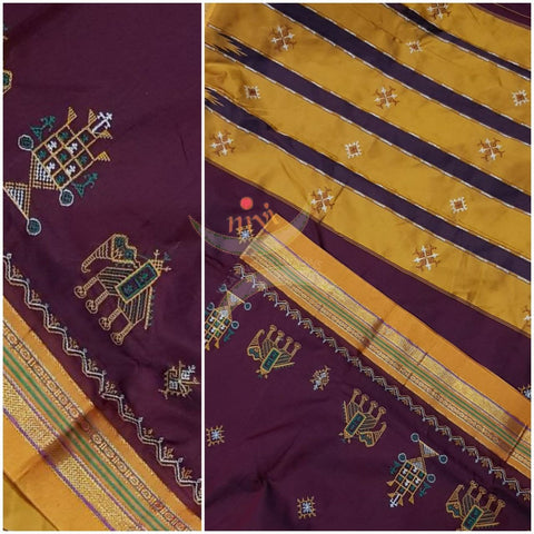 Maroon with mustard border and pallu silk cotton kasuti embroidered Ilkal with Anne ambari  motif and traditional tope teni pallu . 