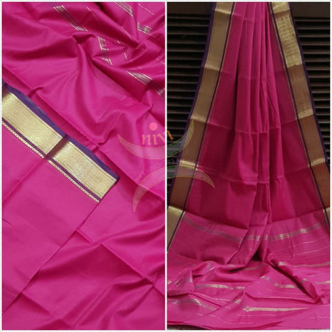 Fuschia pink cotton blended with zari border and zari stripes pallu.