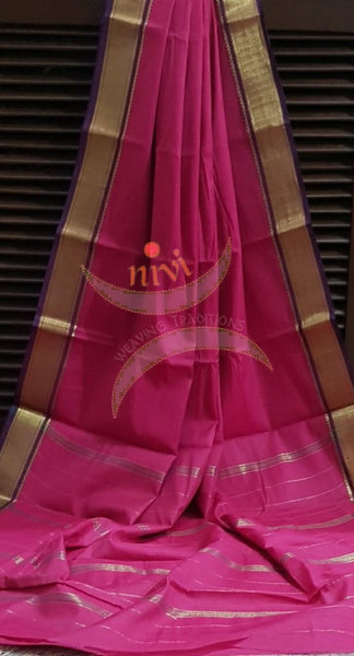 Fuschia pink cotton blended with zari border and zari stripes pallu.