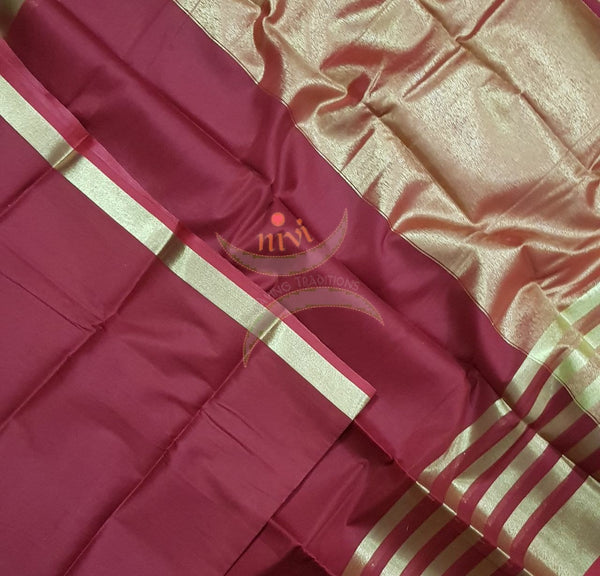 Red cotton blend with tissue striped border and tissue pallu.