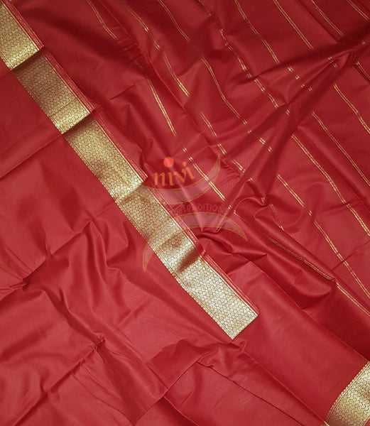 Red cotton blend saree with zari border and thin stripes on pallu.