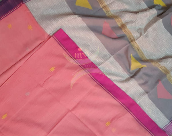 Peach  Handloom linen with woven buttis on body, Ganga jamuna border of fuschia and purple colour and woven geecha pallu.  Saree comes with contrasting grey blouse.