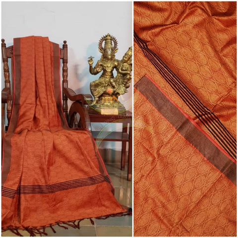 Brick orange Bengal handloom cotton tussar with all over jacquard weaving. Saree comes with running blouse.