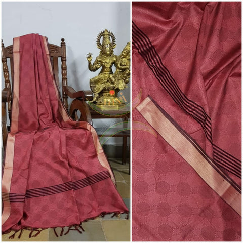 Maroon Bengal handloom cotton tussar with all over jacquard weaving. Saree comes with running blouse.