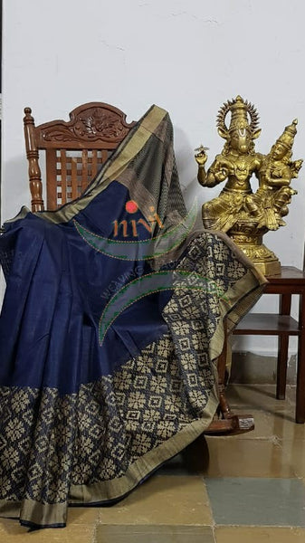 Royal blue Bengal handloom tussar with jacquard woven skirt border with striped geecha pallu.