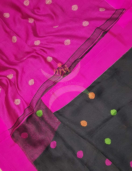 Black handloom linen with polka dots and contrasting fuschia pink border, pallu and blouse.