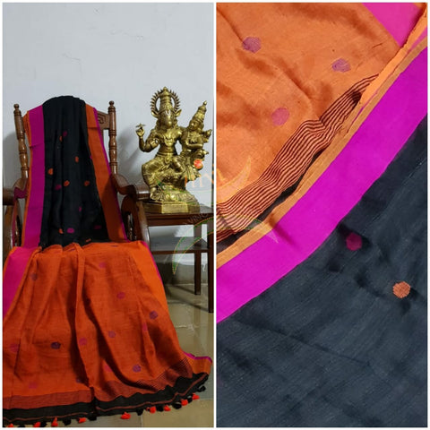 Black handloom linen with polka dots and Ganga jamuna border, contrasting orange pallu and blouse.