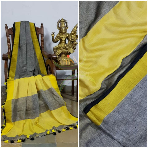 Grey 80s count pure handloom linen with contrasting yellow border, pallu and blouse.