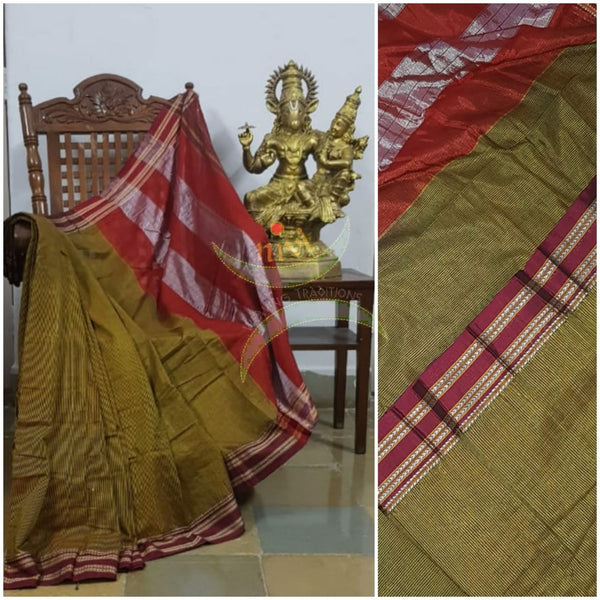 Mehendi green handloom cotton narayanpet Saree with pin striped checks all over body and traditional tope teni pallu. The Saree comes with striped blouse.