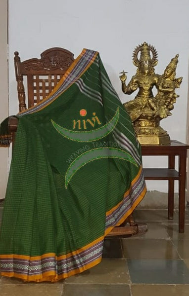 Green handloom narayanpet cotton saree with contrasting mustard borders and striped pallu. The Saree comes without blouse.