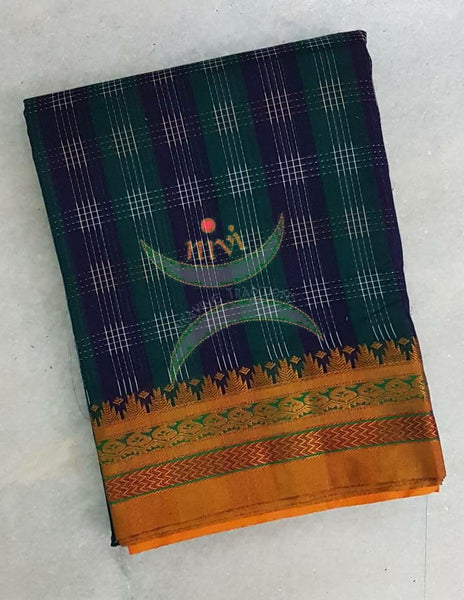 Green blue handloom silk cotton ilkal with ikat effect checks and traditional tope teni pallu. Saree comes with running blouse.