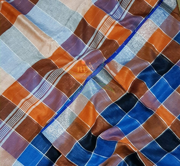 Multi coloured checkered linen with subtle silver border and strips on pallu. Sarees comes with running blouse.