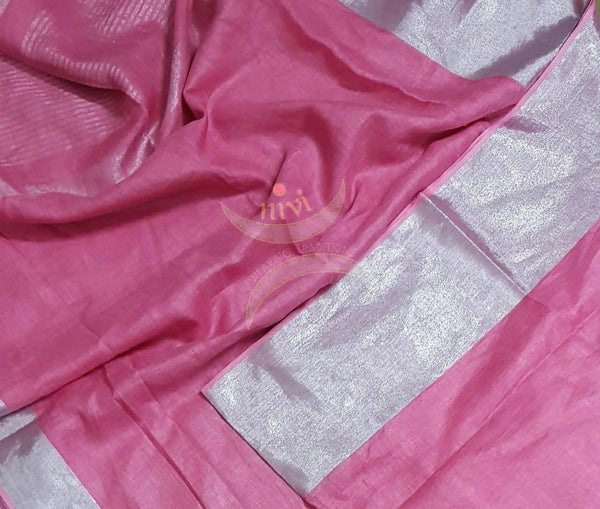 Pink pure linen with subtle silver borders and striped pallu. The Saree comes with running blouse.