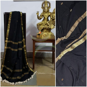 Black handloom dupatta with subtle gold borders, geecha stripes and buttis all over the body.