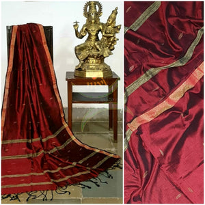 Maroon handloom dupatta with subtle gold borders, geecha stripes on egdes and buttis all over the body.