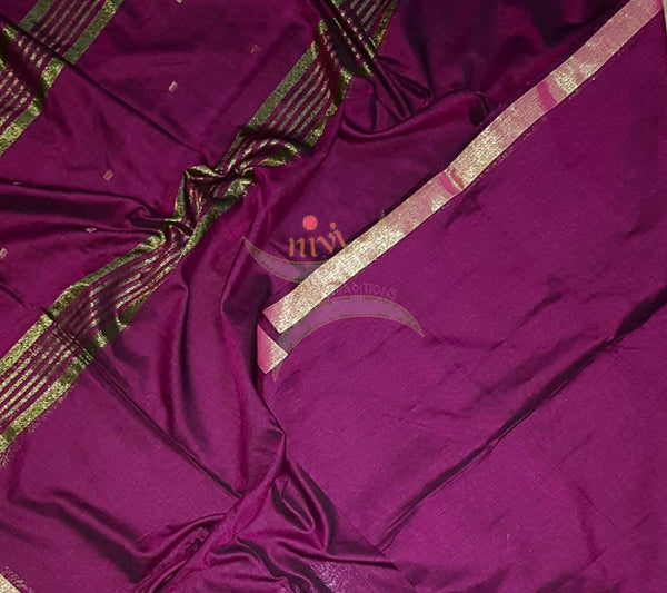 Magenta shot purple handloom dupatta with subtle gold borders.