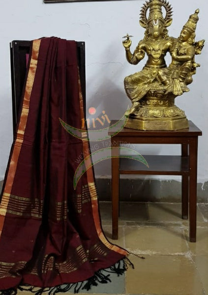Maroon handloom dupatta with subtle gold borders and buttis all over the body.