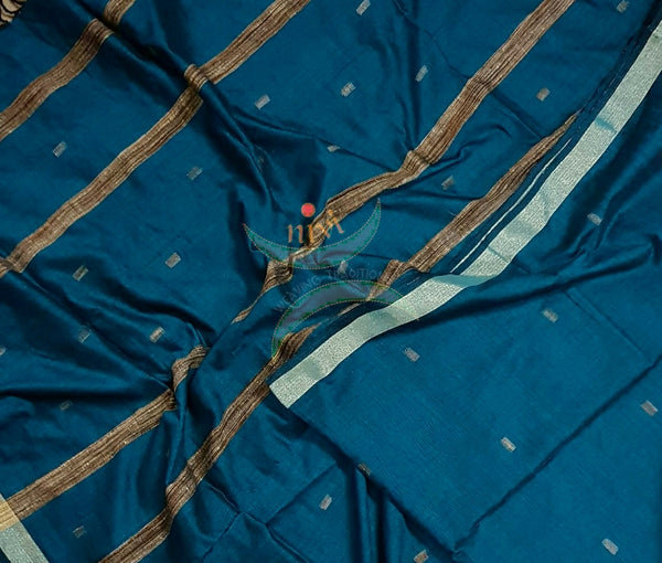 Teal blue handloom dupatta subtle gold borders, geecha stripes on egdes and buttis all over the body.