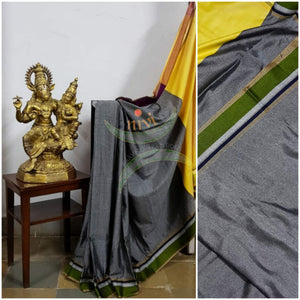 Grey handloom cotton with contrasting green border, contrasting yellow pallu  and contrasting beige blouse.