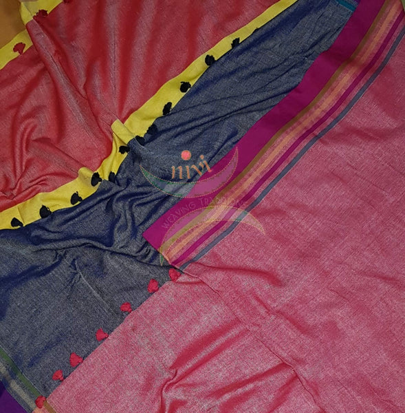 Pink handloom cotton with contrasting multicoloured border, pompoms on pallu  and contrasting beige blouse.