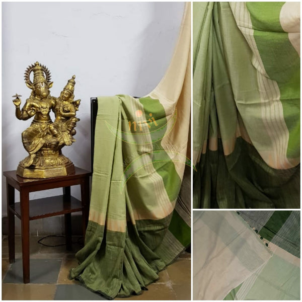 Mint green handloom cotton with contrasting dark green skirt temple border and contrasting beige  blouse piece.