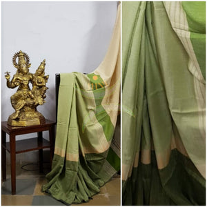 Mint green handloom cotton with contrasting dark green skirt temple border and contrasting beige  blouse piece.