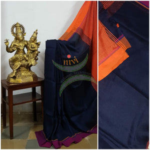 Navy blue 80's count handloom linen with contrasting orange border, pallu and blouse.