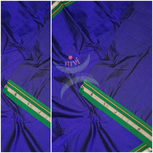 Royal blue  Khun/khana running material with green border. Width of the fabric is 36 inches.