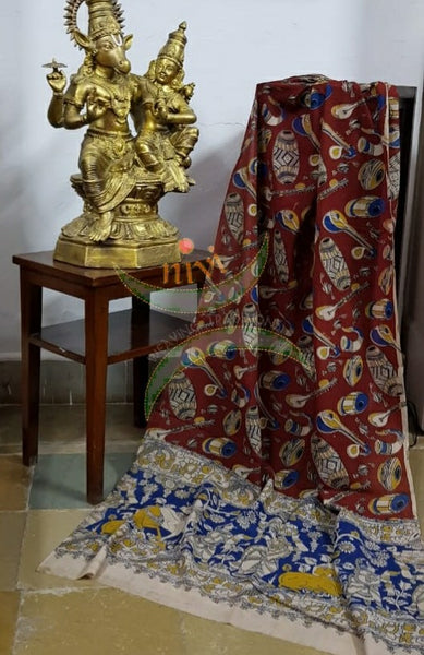 Handloom cotton maroon musical instruments motif print kalamkari dupatta and bottom with mustard mangalgiri Cotton top.