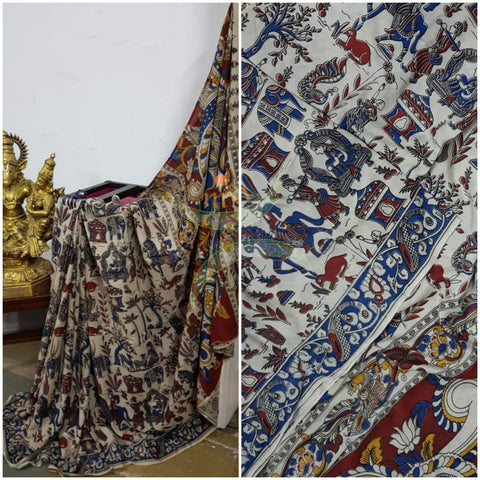 Off white handloom chennur silk kalamkari with village scene motif on body and peacock motif on pallu. The Saree comes with kalamkari printed blouse piece.