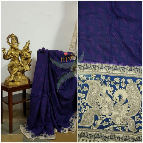 Royal blue handloom chennur silk kalamkari with purple elephant motif on body and peacock motif on pallu. The Saree comes with kalamkari printed blouse piece.