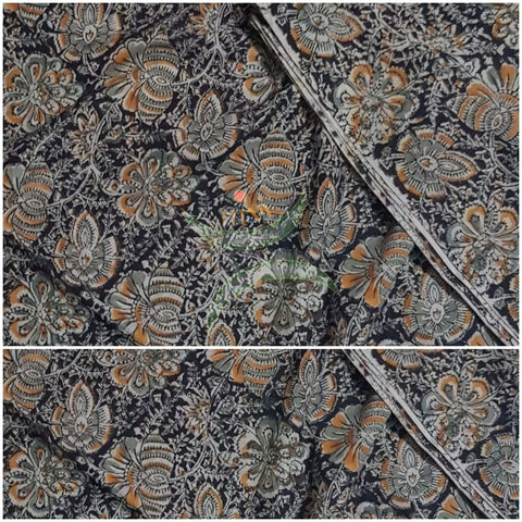 Brown handloom cotton kalamkari fabric with floral motif.