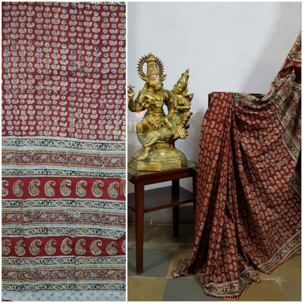 Red handloom venkatagiri cotton kalamkari saree with all over paisley motifs. The Saree comes with kalamkari printed blouse piece.