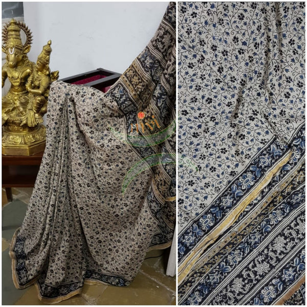 Cream handloom venkatagiri cotton kalamkari saree with all over floral motifs. No blouse piece.