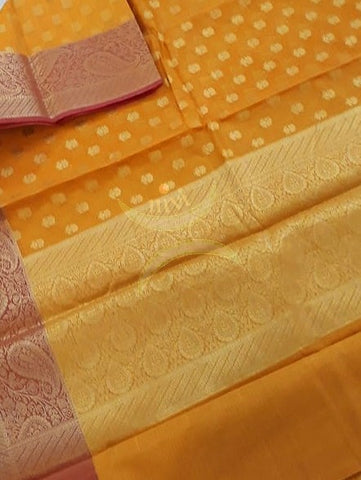 Orange  silk cotton benaras brocade with antique zari motifs The saree comes with blouse piece.