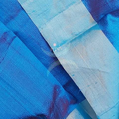 Blue handloom raw silk blouse piece with silver border.