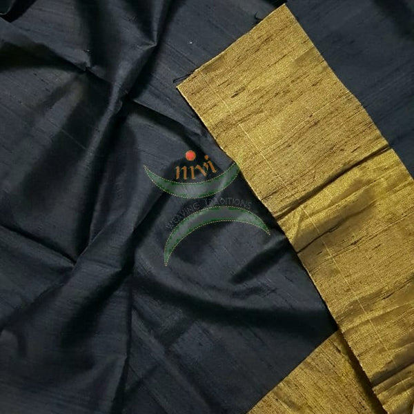 Black handloom raw silk blouse piece with gold border.