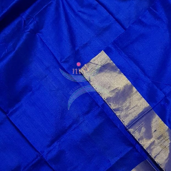 Royal blue handloom raw silk blouse piece with gold border.