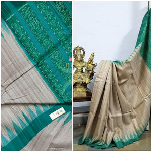 Handloom sambalpuri geecha tussar with contrasting sea green temple border and pallu.