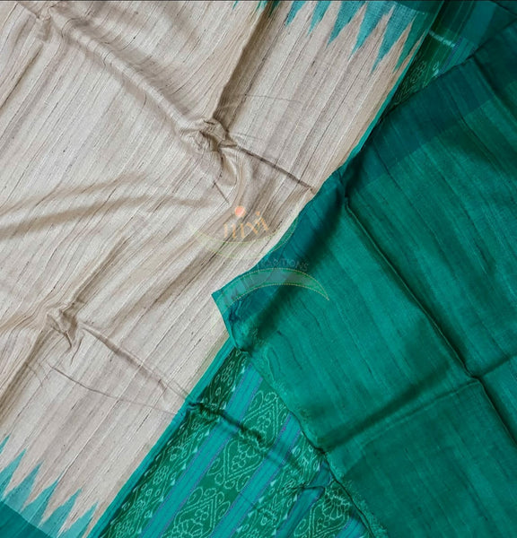 Handloom sambalpuri geecha tussar with contrasting sea green temple border and pallu.