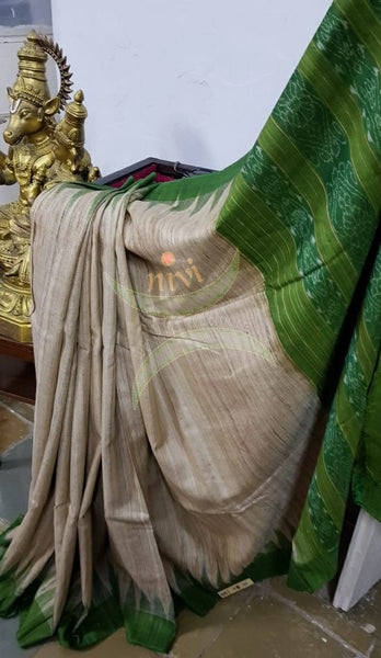 Handloom sambalpuri geecha tussar with contrasting green temple border and pallu.