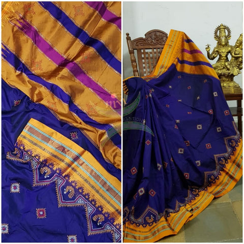 Royal blue ilkal silk cotton with mustard border and peacock motif kasuti embroidery.
