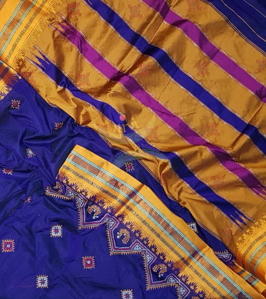 Royal blue ilkal silk cotton with mustard border and peacock motif kasuti embroidery.